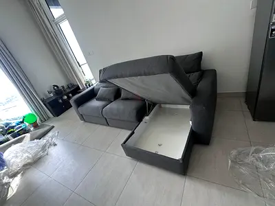 Eskilstuna L shape sofa bed under storage