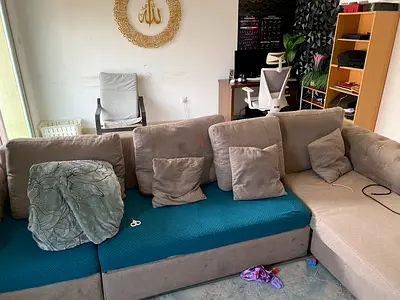 L-Shaped Sofa with Cushions