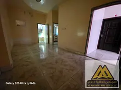 We present a ground floor studio for annual rent in Al Rashidiya, located on Mina Street in a prime