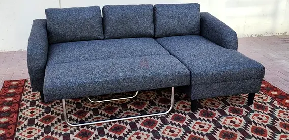 Modern design Grey Sofa Bed with strong structure and soft cushions.