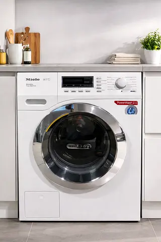 Miele model WTF130 WPM 7 kg washer and 4 kg dryer combines washer dryer freestanding