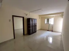 For annual rent: One bedroom, living room, kitchen, two bathrooms, and two balconies. Laundry room.