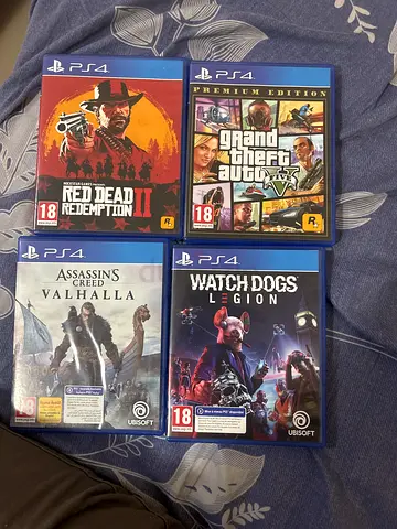 Collection of PS4 Video Games: GTA V, Red Dead Redemption II, Watch Dogs ,Assassins Creed Valhalla