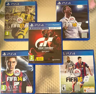 Collection of PlayStation 4 FIFA Games and Gran Turismo