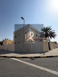 A two-story villa for rent in Al-Shahbaa consists of four bedrooms, five bathrooms, a living room, a
