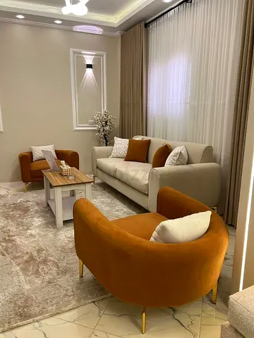 Elegant Modern Living Room with Warm Accents