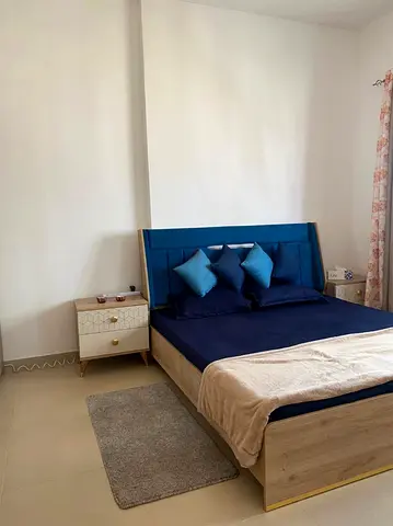 For sale Comfortable King Size Bed with two side tables, Dressing table, 6 doors wardrobe.