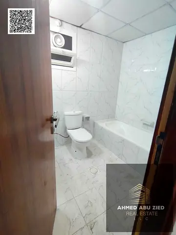 3-bedroom apartment with a living room for annual rent in Ajman, UAE | 2 master bedrooms + maid's room with master bedroom | 4 bathrooms | 2 balconies