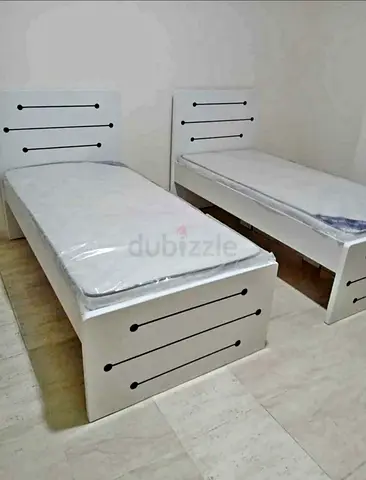 Simple White single Beds with Mattresses
