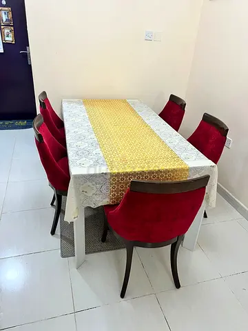 Dining Table with Red Velvet Chairs