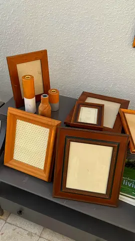 Collection of Vintage Wooden Picture Frames and Decorative Items