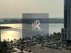 Two-bedroom apartment with a living room for rent in Al Khan area, Sharjah, featuring an excellent l