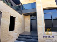 Luxury villa for sale in Al Zahia, 3,600 sq ft, 5 master bedrooms, indoor &amp; outdoor majlis, hang