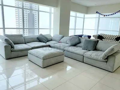 Pan Emirates pianca Feather filled sofa with footstool