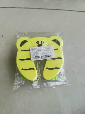 Door stopper to prevent pinching of kids and baby fingers