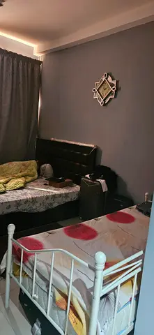 One bedroom to be shared amongst 2 females. (The building is outside Insurance Market Metro Station)