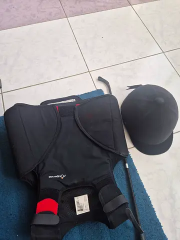 Horse riding jacket and head cap
