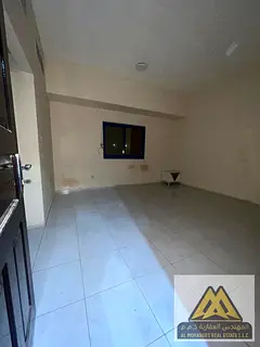 For annual rent: A spacious one-bedroom apartment in Al Nuaimiya 2, Ajman. This prime location offer
