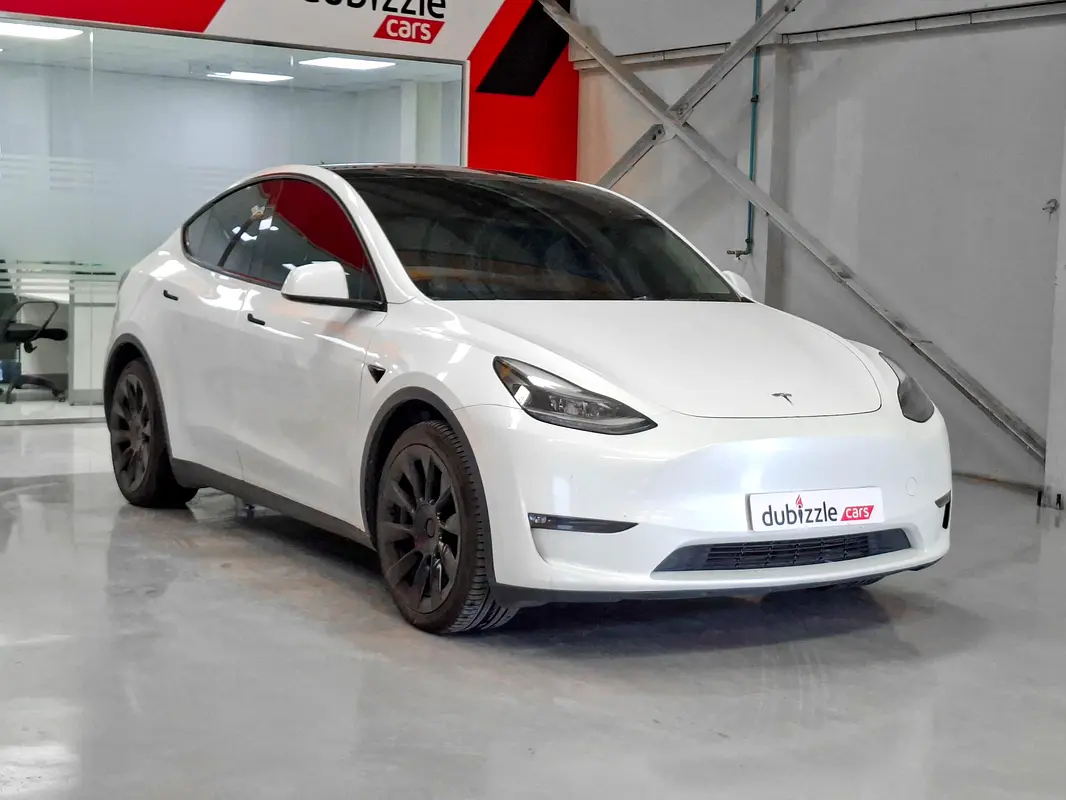 Tesla Model Y 2024 — photo 1 of 15