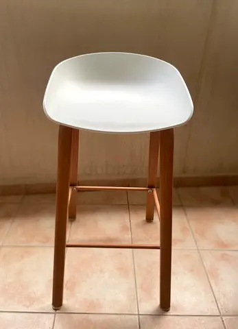 Modern White Bar Stool with Wooden Legs. There are 2 chairs in total