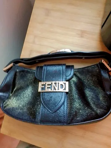 Genuine FENDI stunning bag with real gold tinted fur