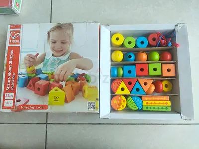 Hape String Along Shapes Educational Toy