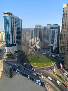 Two-bedroom apartment with a living room for rent in the Al Khan area of Sharjah, near the lake, wit