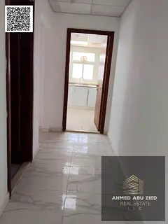 Two bedrooms and a living room for annual rent in Ajman, Emirates City | Master bedroom + living roo