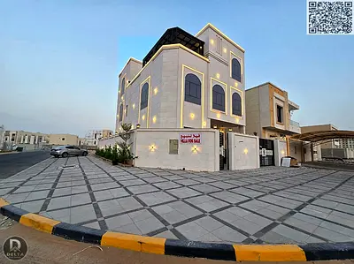 Villa for sale in Al Amrah, one of the most prestigious and tranquil areas in Ajman. This elegant villa features two facades clad in luxurious stone a