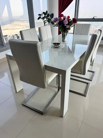 Modern Glass Dining Table with White Chairs