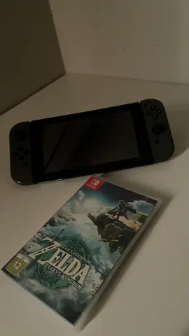 Nintendo Switch ( grey edition ) + The legend of Zelda tears of the kingdom.