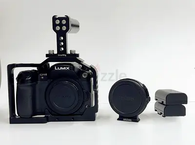 Panasonic Lumix GH4 Camera Cage with Extra Batteries + metabones speed booster + v log active