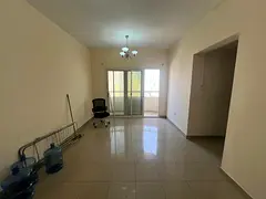 2-bedroom apartment with living room in Abu Shagara, balcony with open view, central AC, spacious pr