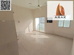 A 2 bedroom apartment with a living hall is available for annual rent in Al Rashidiya behind Falcon