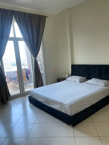 Master bedroom with balcony and attached washroom