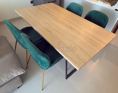 Stylish Wooden Dining Table with Green Velvet Chairs