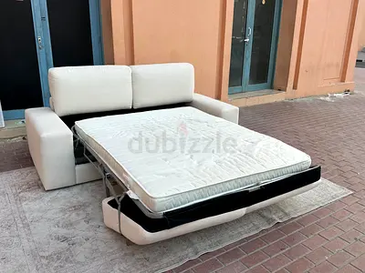 Natuzzi two seater sofa bed with mattress