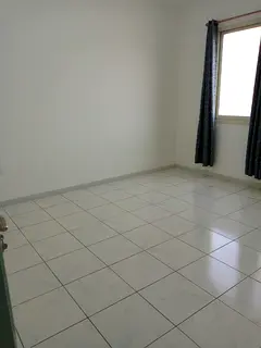 spacious two bedroom apartment with a comfortable living room, ideal for family living in one of the