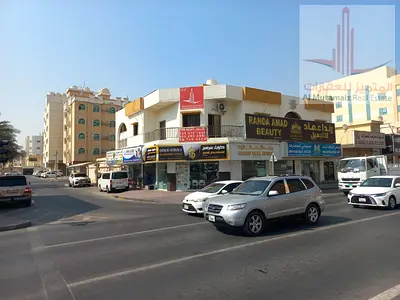 رصة استثمارية – بناية سكني تجاري زاوية على شارع الكويت بدخل سنوي ممتاز