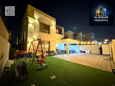 Stunning villa for sale, 5000 sq ft, including water, electricity, and air conditioning - Ajman, main street, freehold, open to all nationalities
