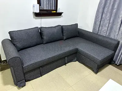 Stylish gray sofa bed, built-in storage space, comfortable for sitting and sleeping, space-saving de