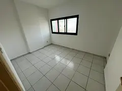 spacious two bedroom apartment with a comfortable living room, located in a lively area close to all