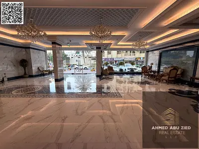 One-bedroom apartment with a living room for annual rent in Al Nuaimiya 3, Ajman, with a balcony, open view, two bathrooms, and free parking. Close to