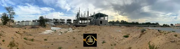 Townhouse plot for sale, including registration and transfer fees, in Al-Haliou 1