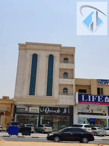 بناية للبيع في منطقة الروضه 2- علي شارع الشيخ عمار بدخل سنوي 700000