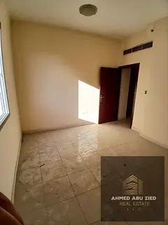 Two bedrooms and a living room in Al Nuaimiya 1 | Balcony | Central air conditioning | Near Al Hikma