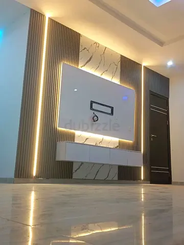 Modern Minimalist TV Wall Unit with Integrated Lighting