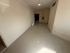 Two-bedroom apartment for annual rent in Al Nuaimiya 2, Ajman, in a prime location on Kuwait Street,