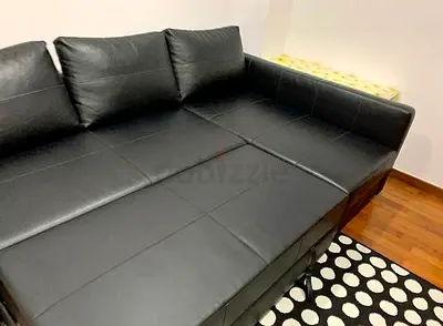 Stylish Black Leather Sofa bed in Great Condition