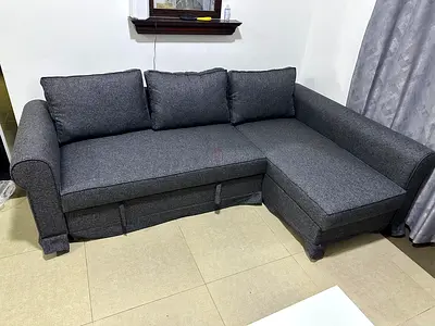 Contemporary gray sofa bed, large storage box, perfect for home, apartment or studio.
